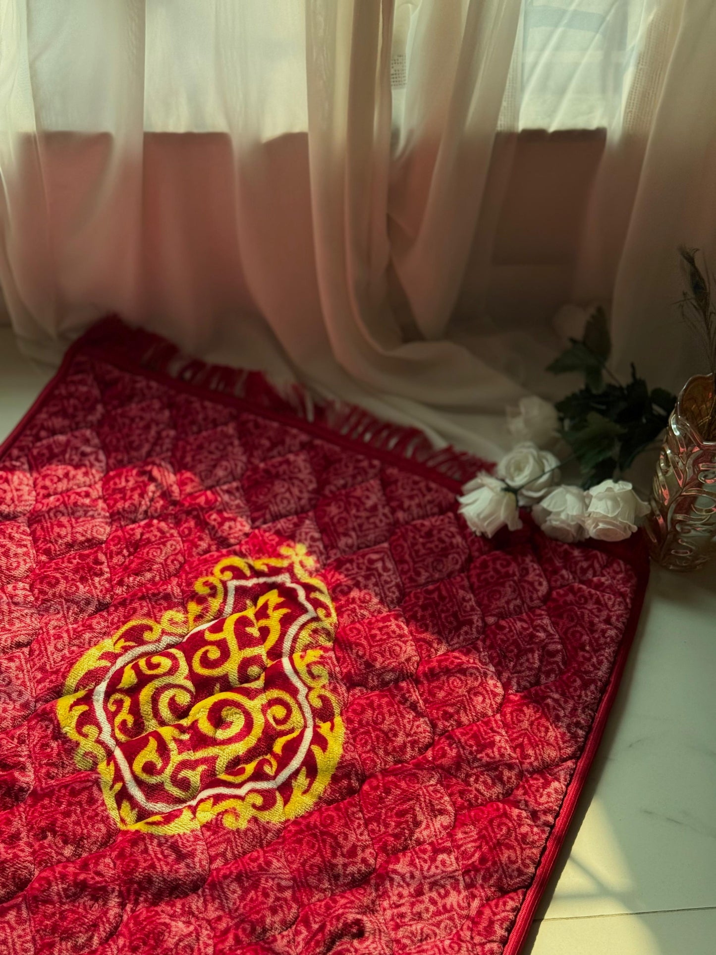 A Red Bridal jaynamaz - prayer Mate with a motive design online available at Idara-e-Islamiat, displayed for daily Muslim prayers. an ideal wedding gift 